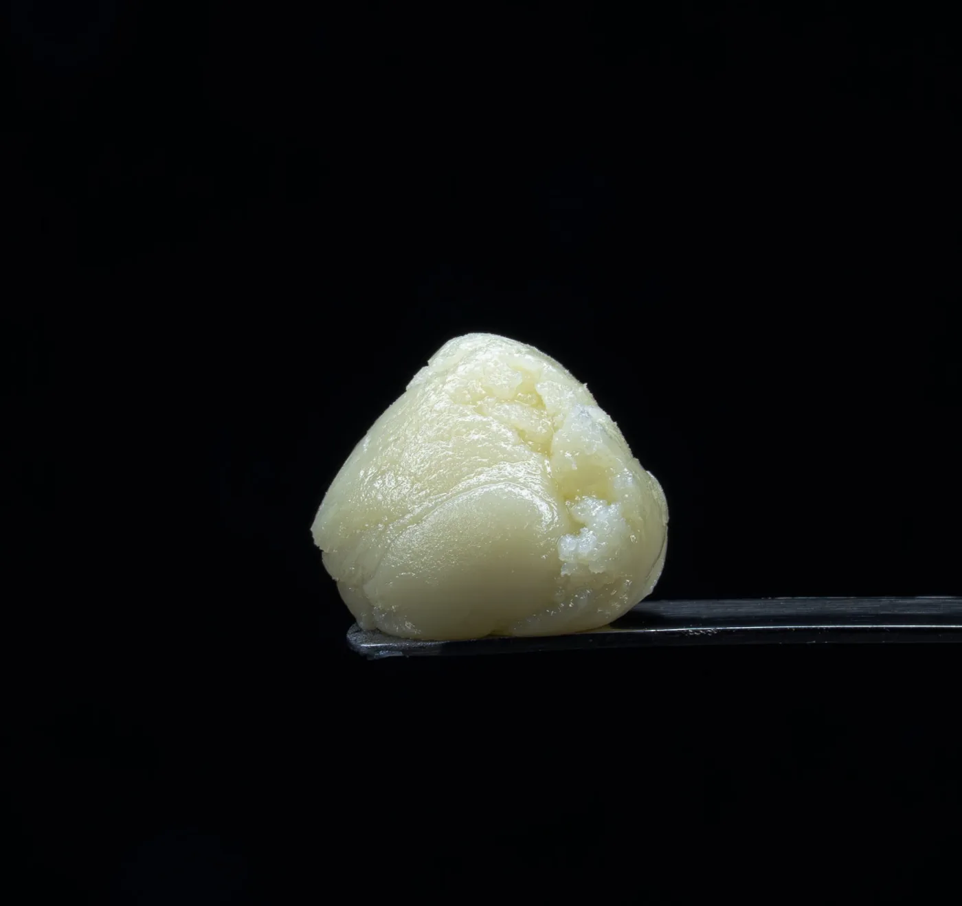Black Cherry Garlic hash rosin by Outlaw Extracts, pressed in house and sold at High Desert Relief dispensaries in Albuquerque, Santa Fe, Bernalillo and Hobbs