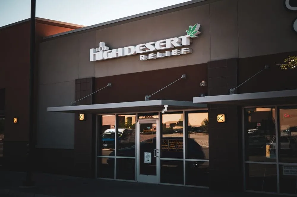 High Desert Relief Santa Fe dispensary storefront on Main St at dusk